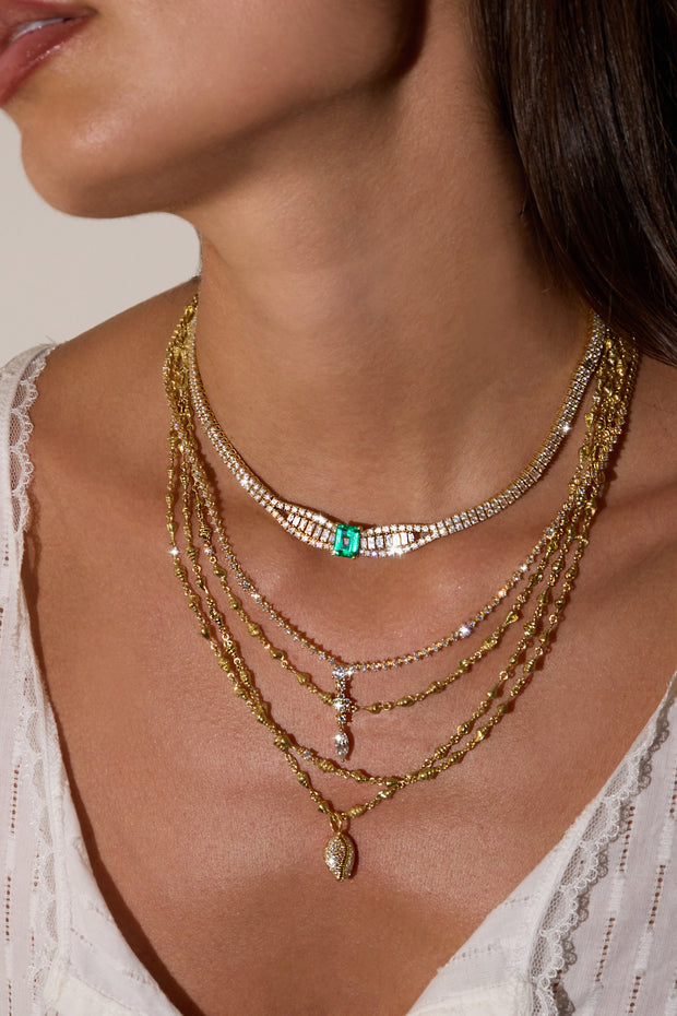 BAGUETTE AND ROUND DIAMOND CHOKER WITH EMERALD CUT COLOMBIAN EMERALD CENTER