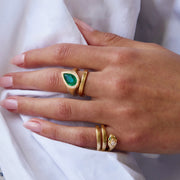 SIDEWAYS COLOMBIAN PEAR EMERALD AND PAVE DIAMOND RING