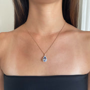 6.65CT LIGHT BLUE SAPPHIRE PEAR PENDANT WITH DIAMOND HALO AND BAIL