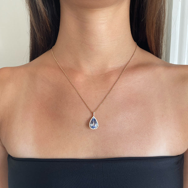 6.65CT LIGHT BLUE SAPPHIRE PEAR PENDANT WITH DIAMOND HALO AND BAIL